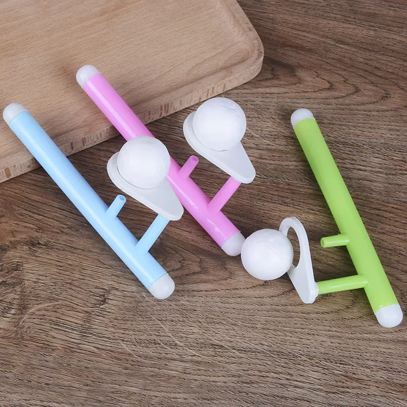 2-in-1 Floating Ball & Whistle Toy